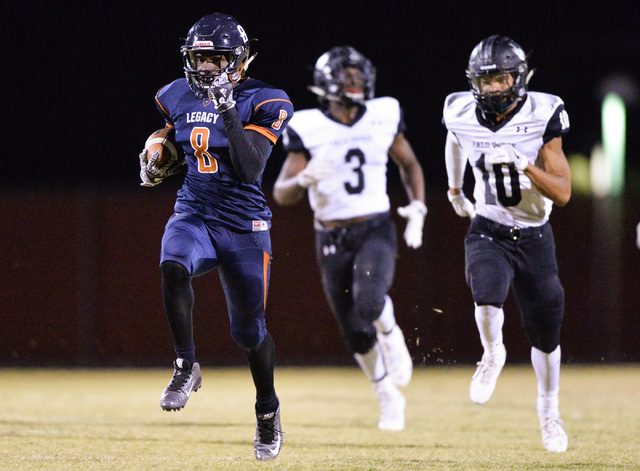 Legacy wide receiver Marquell Evans (8) scores a touchdown during the Legacy High School Pal ...