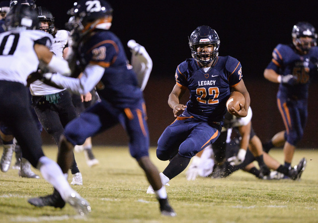 Legacy running back Sam Turner (22) runs the football during the Legacy High School Palo Ver ...