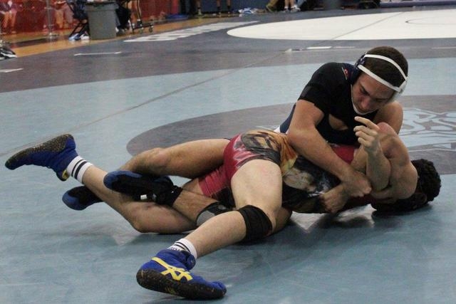 Spring Valley’s Eduardo Penha’s looks into his cheering section, as his hand is ...