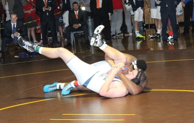 Bishop Gorman’s Jackson Perry pins Shadow Ridge’s Jarrit Leonard to win the 285- ...