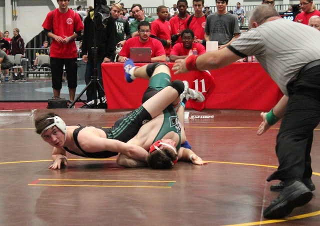 Palo Verde’s Josh Pine goes for the pin against Irvine (Calif.) High School’s Ru ...