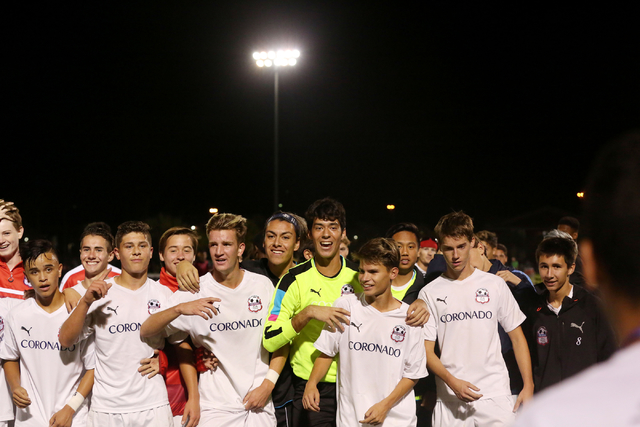 Coronado Cougars soccer team celebrate at the Bettye Wilson Soccer complex where the Cougars ...