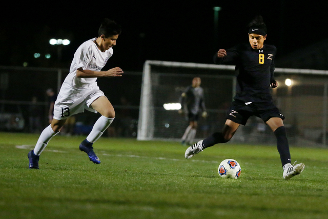 Durango’s Erick Martinez Rodriguez (8) kicks the ball against Coronado at the Bettye W ...