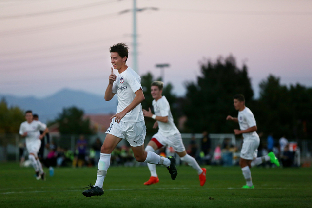 Coronado’s Mat Laudenslager (21) celebrates scoring a goal against Durango at the Bett ...