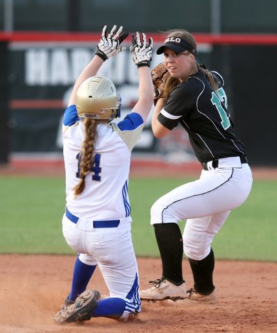 Reed’s Jessica Sellers breaks up a double play attempt by Palo Verde’s Kali Toml ...