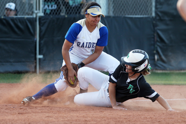 Reed third baseman Carla Hernandez just misses the tag on Palo Verde’s Jordan Menke du ...