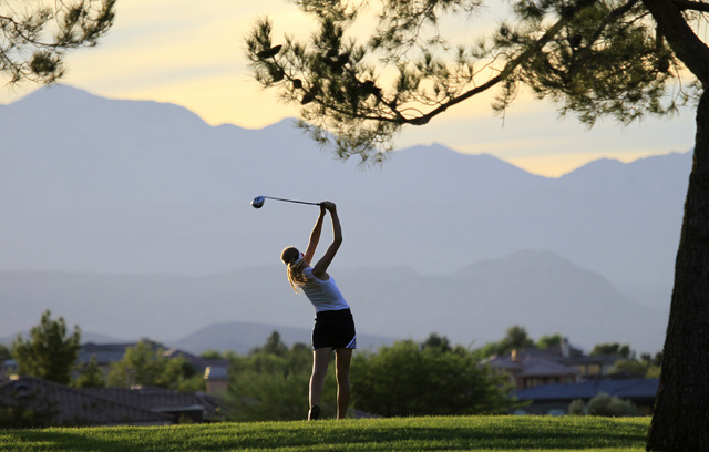 Shadow Ridge’s Allison Weiderman tees off during the Sunset Region girls golf tourname ...