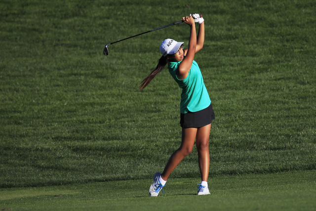 Mercedes Khumnark hits out of the fairway during the Sunrise Region girls golf tournament at ...