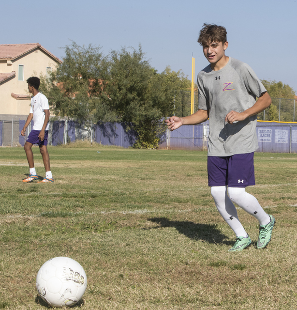 Oscar Rodriguez (12) runs drills during soccer practice at Durango High School in Las Vegas ...