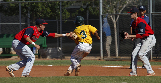 Coronado shortstop Tanner Bellamy, left, tags out Rancho’s Bryce Harrell as pitcher Ja ...