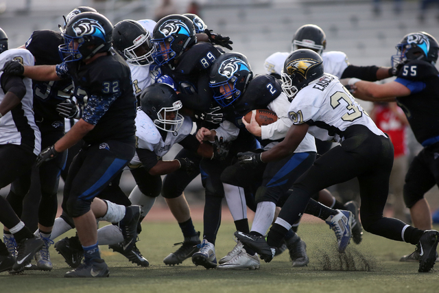 Pahranagat Valley’s Quarterback Tabor Maxwell (2), runs with the ball during the class ...