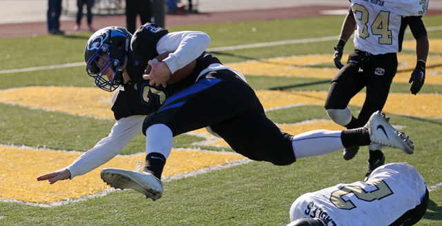 Pahranagat Valley’s Quarterback Tabor Maxwell (2), dives with the ball during the clas ...