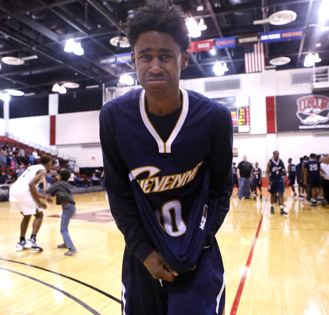 Cheyenne’s Cedric Coleman (10) reacts after his team loss to Desert Pine in a Class 3A ...