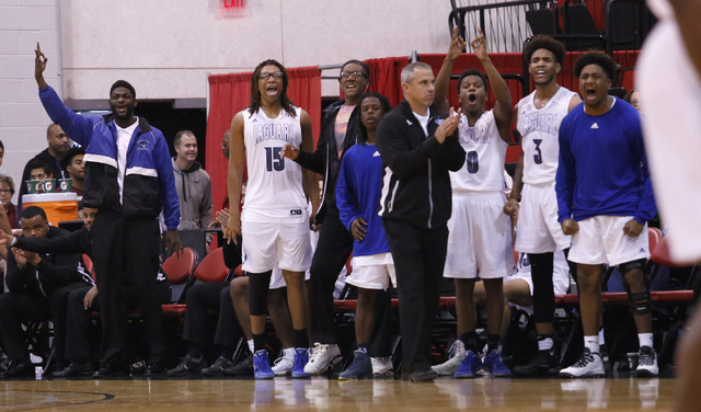 Desert Pines players react during the first half of a Class 3A boys state final championship ...