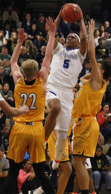 Bishop Gorman’s Chuck O’Bannon (5) shoots during the second half of a Class 4A S ...