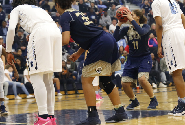 Spring Valley’s Kayla Harris (11) shoots a free throw during the first half of a Class ...