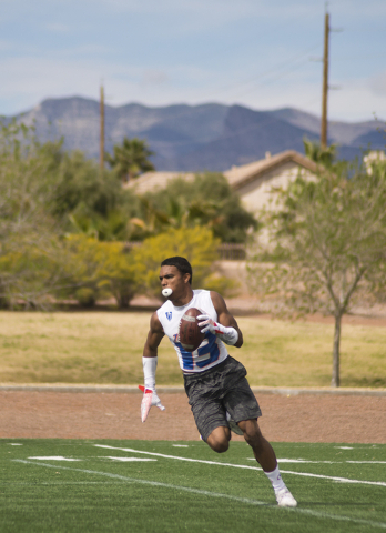 Bishop Gorman cornerback Malik Hausman (13) celebrates after intercepting the ball during 70 ...