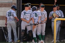 Palo Verde outfielder Cobi Fiechtner (8) shoulder bumps teammates in celebration after scori ...