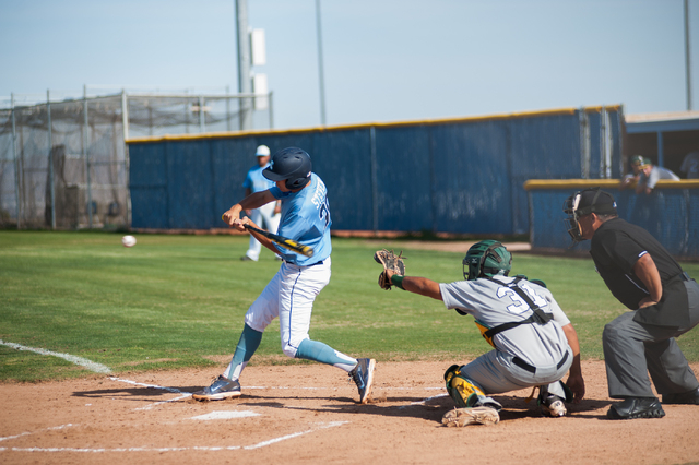 Centennial junior Travis Stevens swings at a pitch against Rancho on Friday. Stevens drove ...