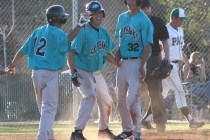 Silverado’s Alex Grafiada (12), Dillon Johnson (21) and Nick Kawano (32) celebrate Vin ...