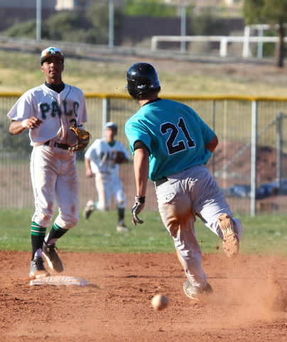 Silverado’s Dillon Johnson (21) heads to second base as Palo Verde’s Will Hamilt ...