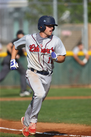 Liberty’s Preston Pavlica (11) runs for first base against Rancho during a game at Ran ...