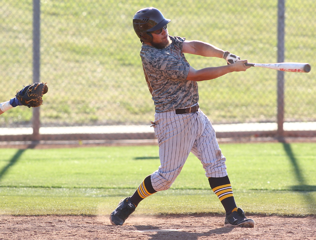 Bonanza’s Keith Werner (29) swings to hit a home run against Green Valley on Friday. T ...