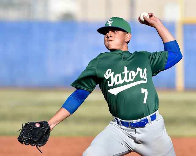 Green Valley pitcher Thomas Rivera fires the ball against Basic during a high school basebal ...