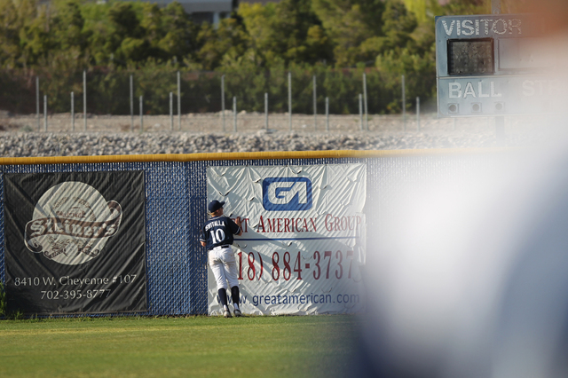 Chatsworth’s Niko Switalla (10) watches a ball hit by Centennial’s Kyle Horton ( ...