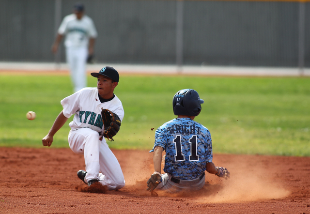 Centennial’s Tanner Wright (11) steals second base during the first inning Friday at S ...