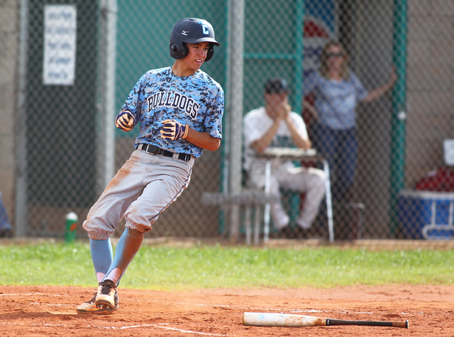 Centennial’s Tanner Wright scores the first run of the game Friday at Silverado. Wrigh ...