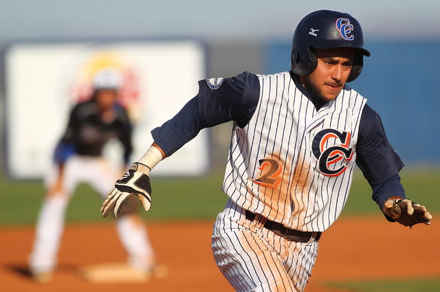 Chatsworth’s Michael Baregamyan (2) runs for third base while playing against Basic du ...