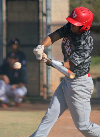 Las Vegas’ Eddie Ojeda swings during a baseball game against Liberty at Liberty High S ...