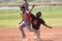 Chaparral’s Jose Ortiz (4) slides into second base as Tech’s Bryan Casas (2) wai ...