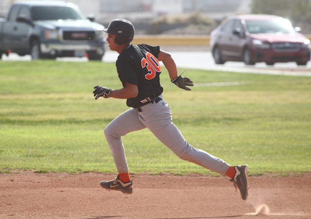 Chaparral’s Luis Giro (30) runs for third base against Tech at Silver Bowl Park on Tue ...