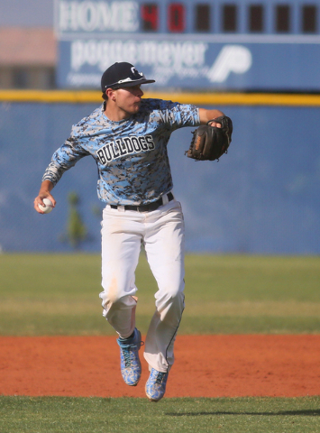 Centennial’s Travis Stevens readies to throw the ball during a baseball game against C ...