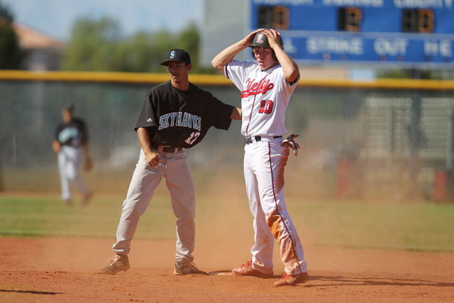 Liberty’s Justin Lutes (10) reacts as he is called out after a tag at second base by S ...