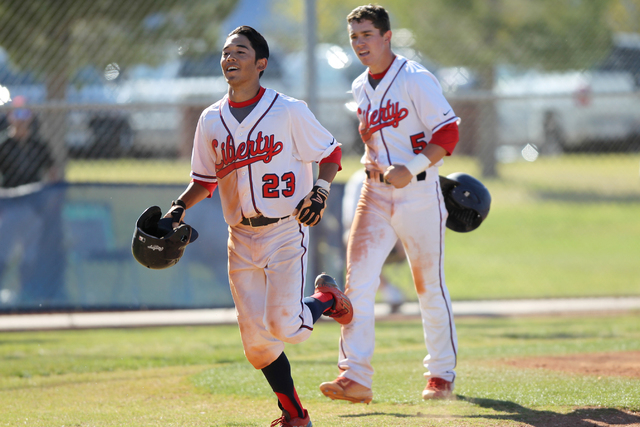 Liberty’s Jonny Gilleres (23) runs home after hitting a two-run home run against Silve ...