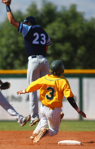 Rancho’s Bryce Harrell (3) steals second base as Foothill’s Nick Cardinale (23) ...