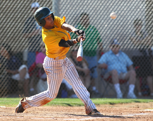 Rancho’s Bryce Harrell drives a single to right during the second inning Friday. Harre ...