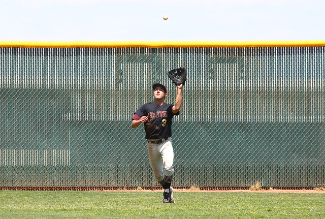 Faith Lutheran’s Cameron Sepede (3) catches a fly ball from Coronado’s Nicco Fes ...