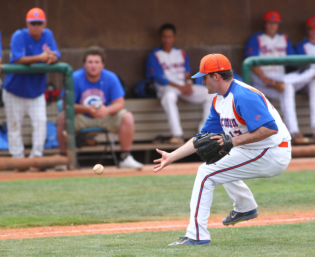 Bishop Gorman pitcher Bronson Bowe (13) fields a bunt while playing in the third inning agai ...