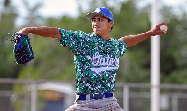 Green Valley pitcher Keola Paragas fires the ball against Rancho on Tuesday. Paragas allowed ...