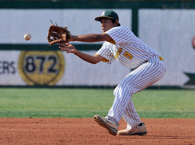 Rancho shortstop Juan Cruz fields the ball against Green Valley on Tuesday. Green Valley won ...