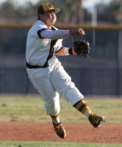 Bonanza infielder Jay DeSoto follows through while throwing a runner out at first during the ...