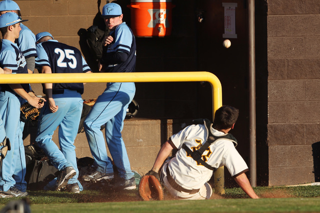 The Foothill dugout reacts as Bonanza catcher Hunter Junge chases a foul during their 13-0 w ...