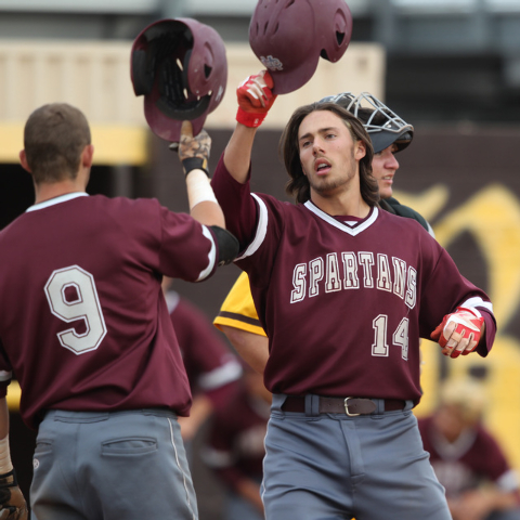 Cimarron Memorial’s Niko Decolati is congratulated after his home run against Bonanza ...