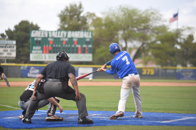 Green Valley’s Austin Primack (7) swings at a pitch against Silverado during their bas ...