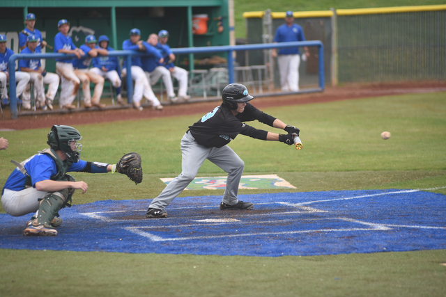 Silverado’s Blake Zorne (33) attempts a bunt against Green Valley during their basebal ...