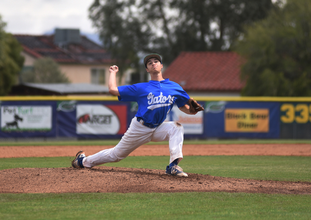 Green Valley’s Justin Caputo (4) pitches against Silverado during their baseball game ...